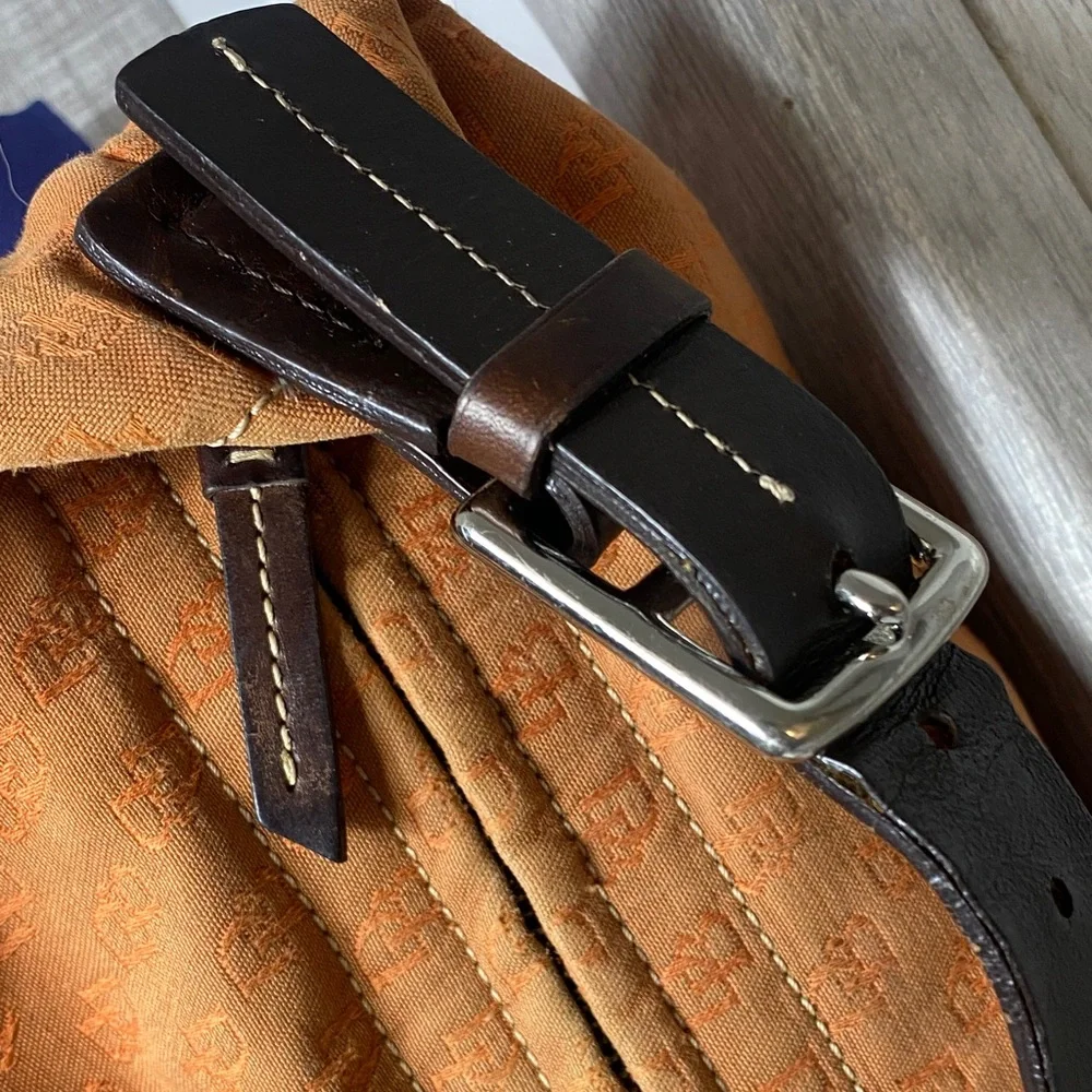 Dooney & Bourke Vintage burnt Orange over the shoulder bucket Bag